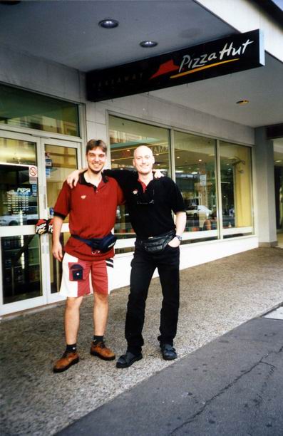 With Mr. DJ in front of our pizzeria.