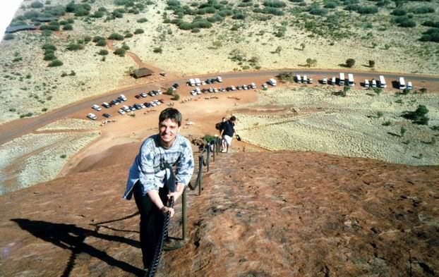 Climbing up Uluru on chain.